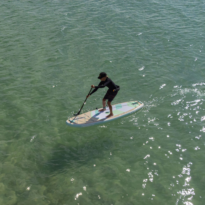 Cargue la imagen en el visor de la galería, boy paddling on thurso surf adept paddle board in ocean